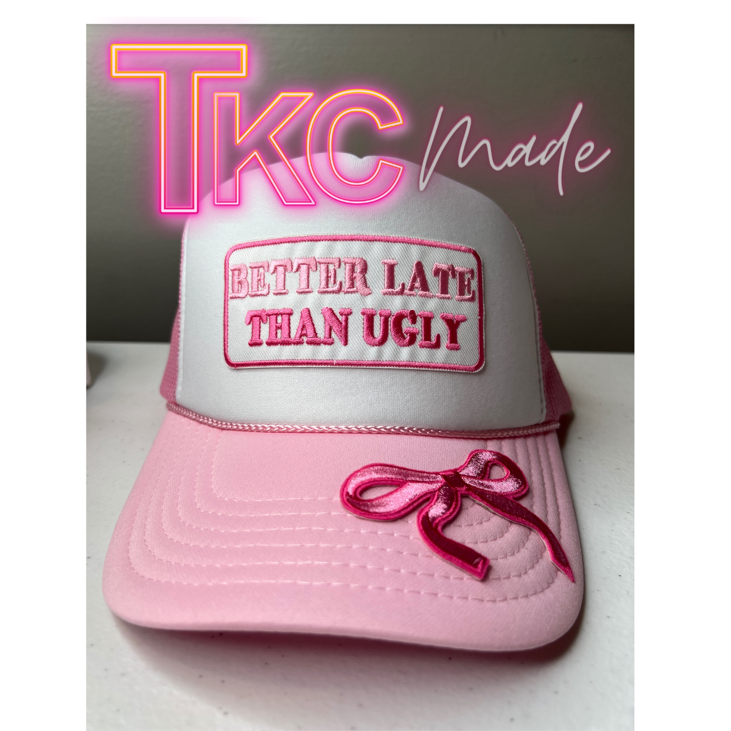 Better late than ugly coquette pink trucker hat
