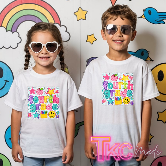 Two children wearing matching white graphic T-shirts with a colorful 'fourth grade' design, standing in front of a decorated wall with cartoon smiley faces, stars, and a rainbow. The child on the right wears sunglasses, and there is a 'TKC Made' watermark at the bottom right.