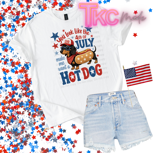 White t-shirt with 4th of July design and denim shorts on a colorful confetti background