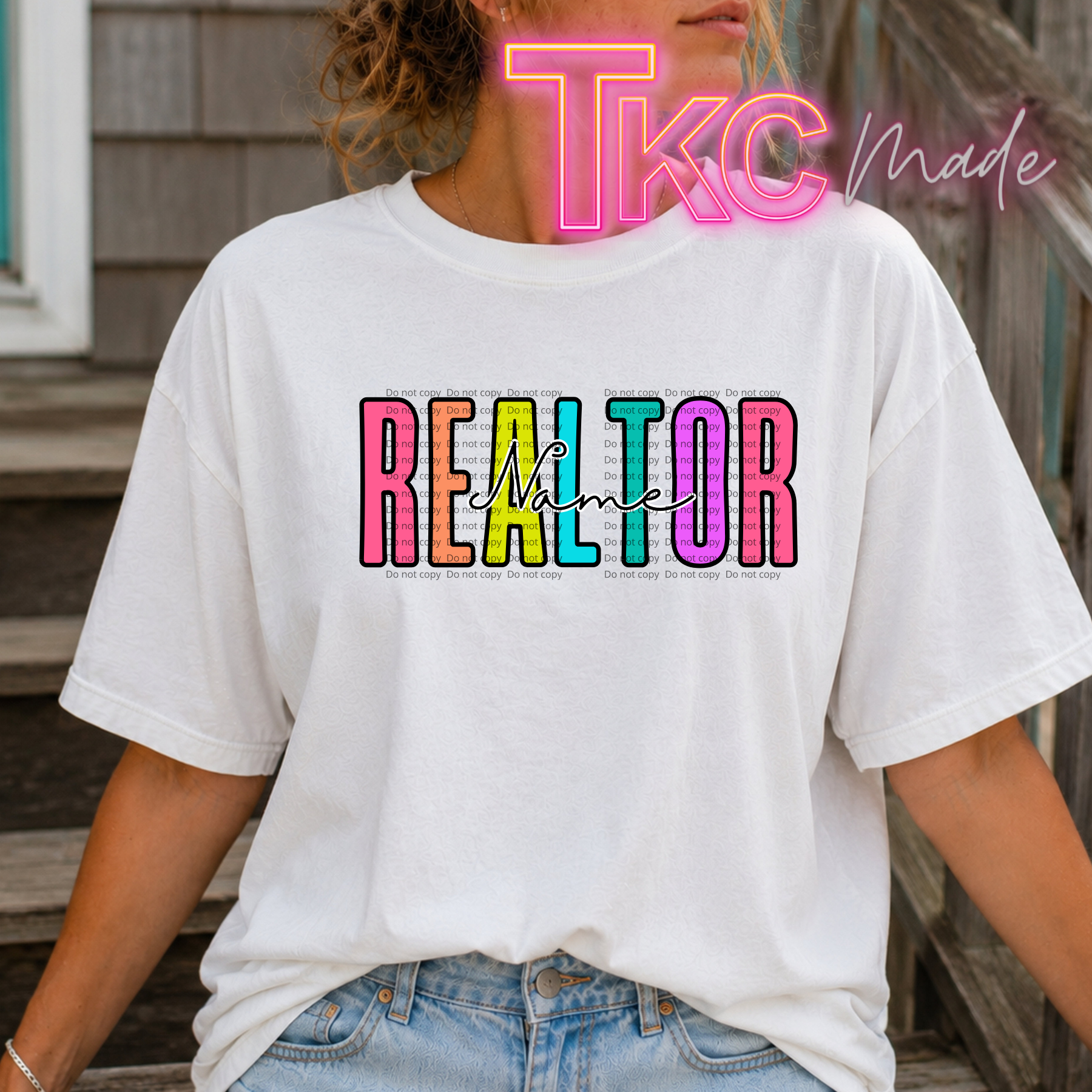 white tee with colorful text that reads "realtor" with a personalized name