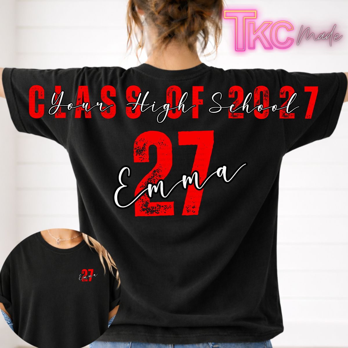 A woman shown from the back wearing a black graphic t-shirt with 'CLASS OF 2027', the name 'Emma', and the number '27' printed in red and white script on the back. A circular inset shows a smaller version of the graphic on the front chest.