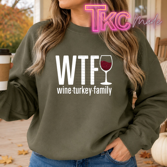 'WTF wine turkey family' text and wine glass graphic