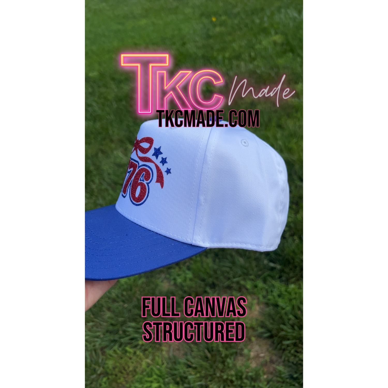 White and blue cap with red and blue design on grass, featuring 'TKC Made' branding.