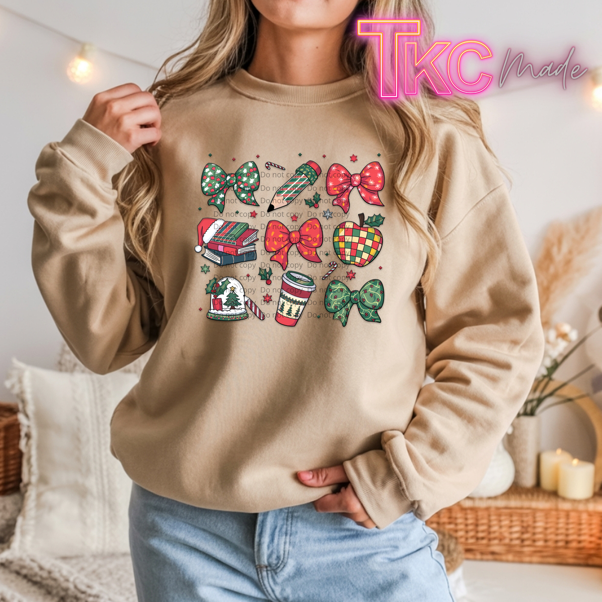 sand sweatshirt with Christmas-themed graphics for teachers