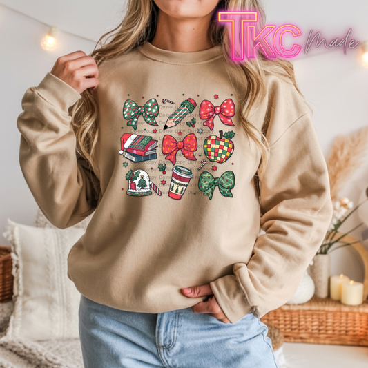 sand sweatshirt with Christmas-themed graphics for teachers