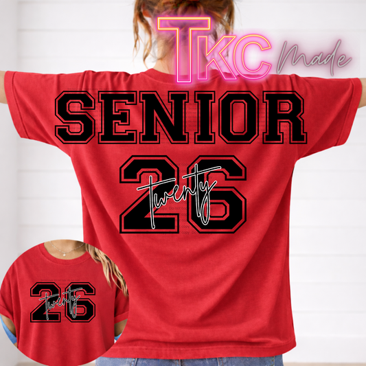 Red t-shirt with 'Senior 26' printed on the back, worn by a person.