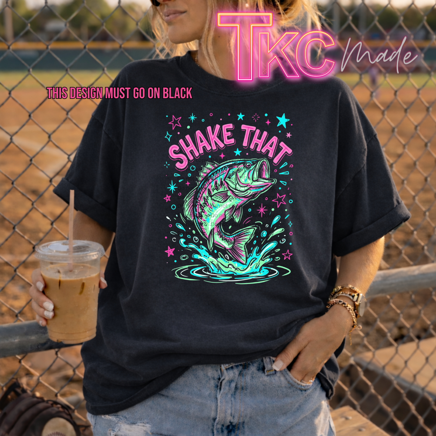 design saying shake that with a picture of a bass under with doodle stars in the background