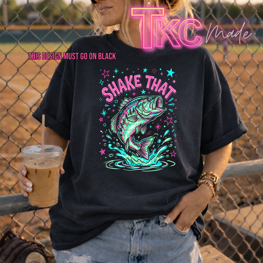 design saying shake that with a picture of a bass under with doodle stars in the background
