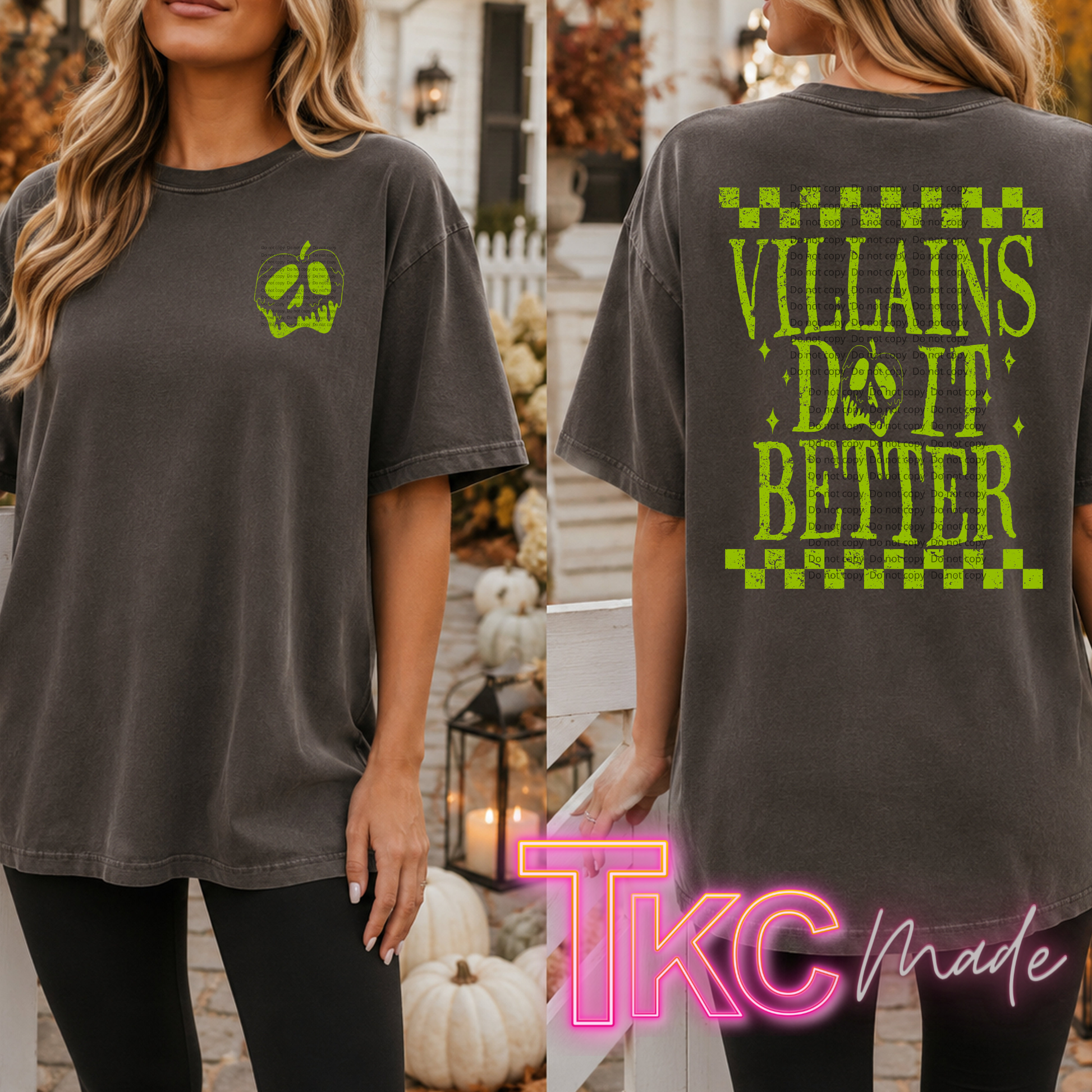 A woman modeling a dark charcoal gray oversized graphic T-shirt shown in front and back views. The front has a small lime green skull-in-pumpkin chest graphic.