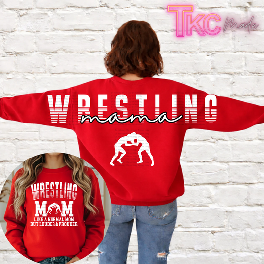 A red crewneck sweatshirt with a white graphic reading 'WRESTLING mama' and a wrestler silhouette, shown on a model from the back against a white brick wall. A circular inset shows the front of the sweatshirt with 'WRESTLING MOM LIKE A NORMAL MOM BUT LOUDER & PROUDER'.