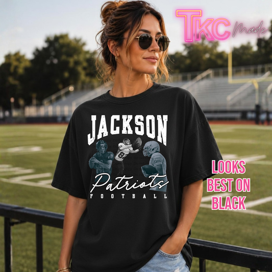 A woman wearing a black graphic t-shirt with 'Jackson Patriots Football' printed on the front, standing on a football field. The image features 'TKC Made' and 'LOOKS BEST ON BLACK' text overlays.
